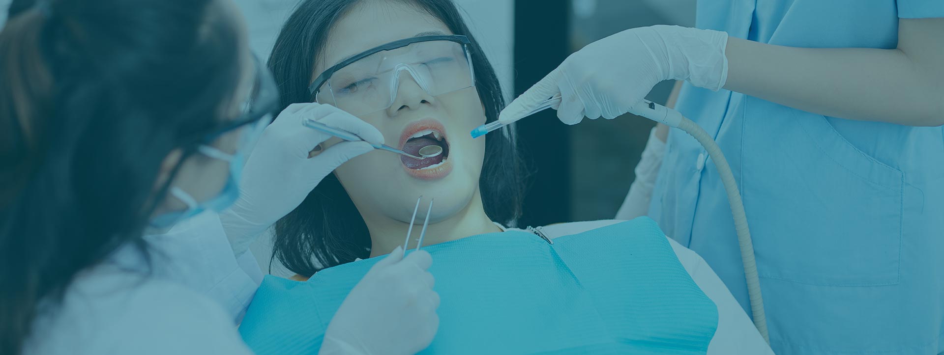 Woman having root canal treatment at the dental