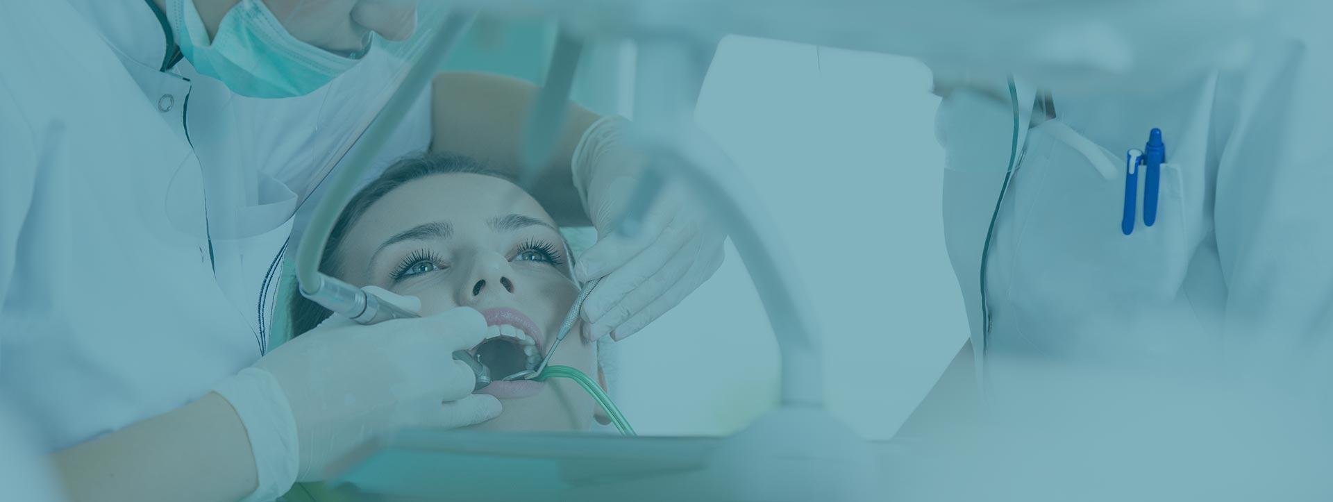 Woman having dental surgery